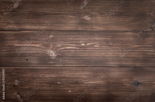 Brown rustic dark wooden texture. Wood plank background.