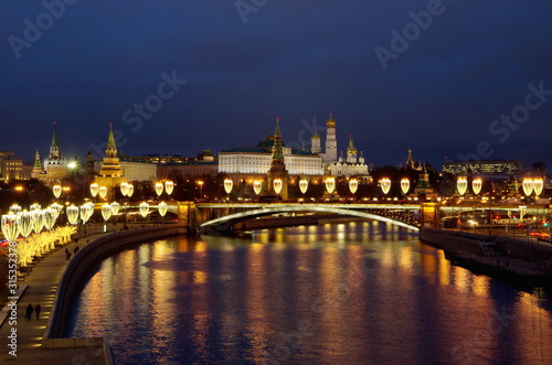 Night view of the Moscow Kremlin and the Big Stone bridge with festive illumination. Moscow, Russia