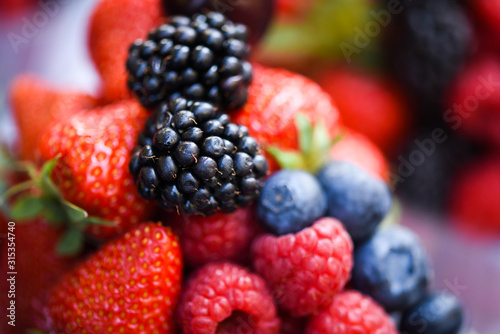 fresh berries close up - strawberries  blueberries  red berries  raspberry  black berries 