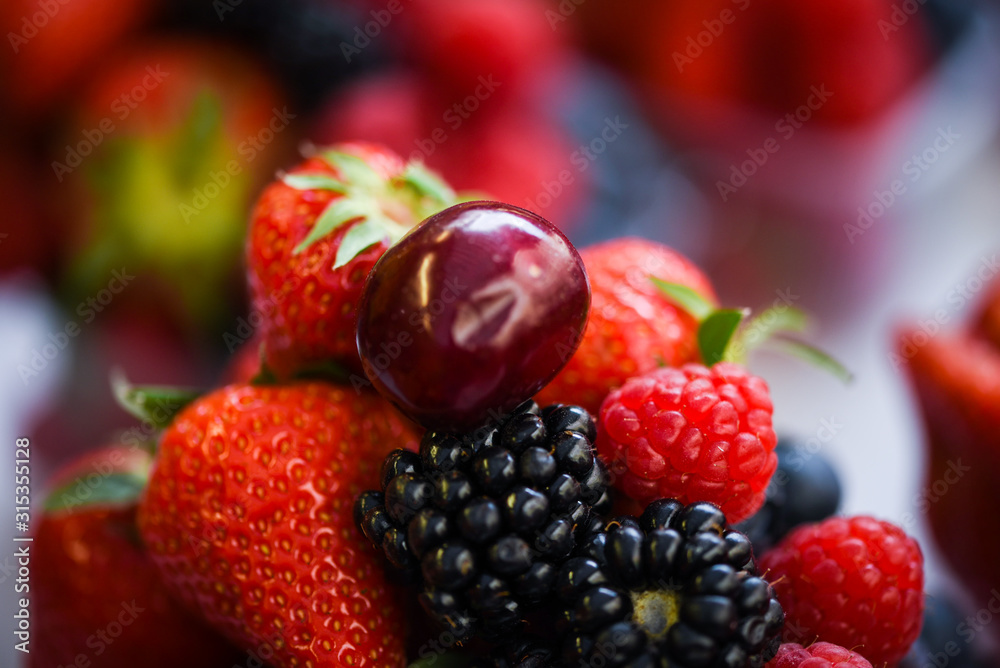 fresh berries close up - strawberries, blueberries, red berries, raspberry, black berries fresh berries close up - strawberries, blueberries, red berries, raspberry, black berries