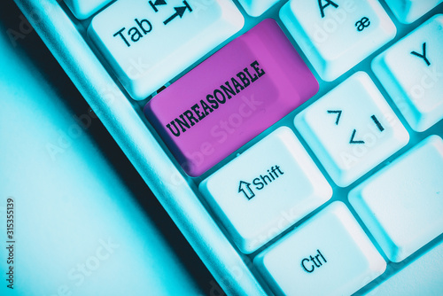 Word writing text Unreasonable. Business photo showcasing Beyond the limits of acceptability or fairness Inappropriate White pc keyboard with empty note paper above white background key copy space