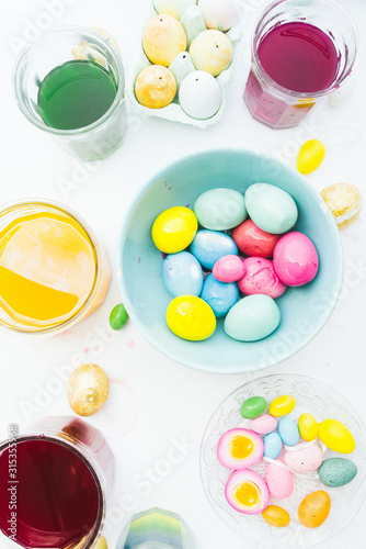 Vászonkép Coloring hard-boiled eggs easter tradition, naturally dyed eggs for easter holid