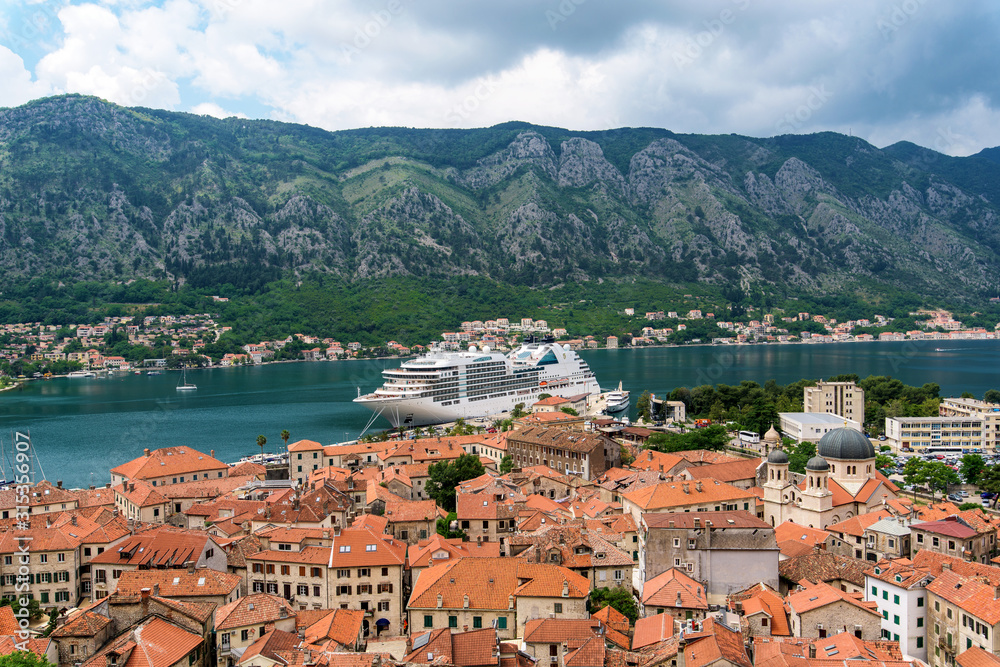 the ship is moored in Montenegro near the historic fortress city. against the background of the Adriatic sea.