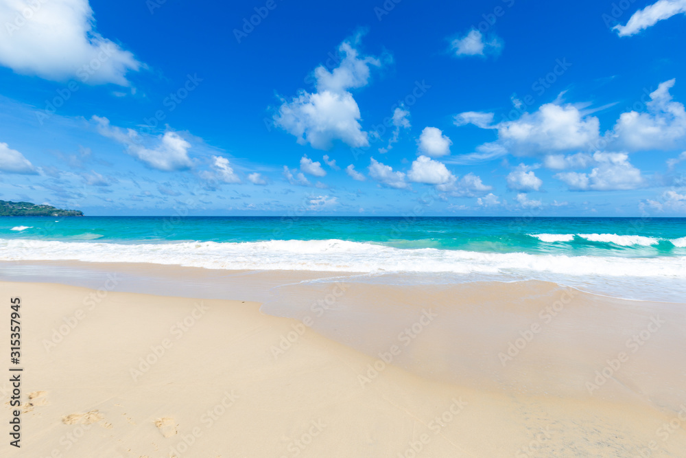 White sand beach turquoise sea water against blue sky with cloud seascape vacation background