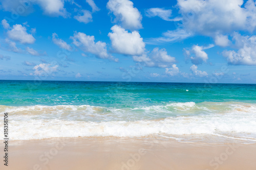 White sand beach turquoise sea water against blue sky with cloud seascape vacation background