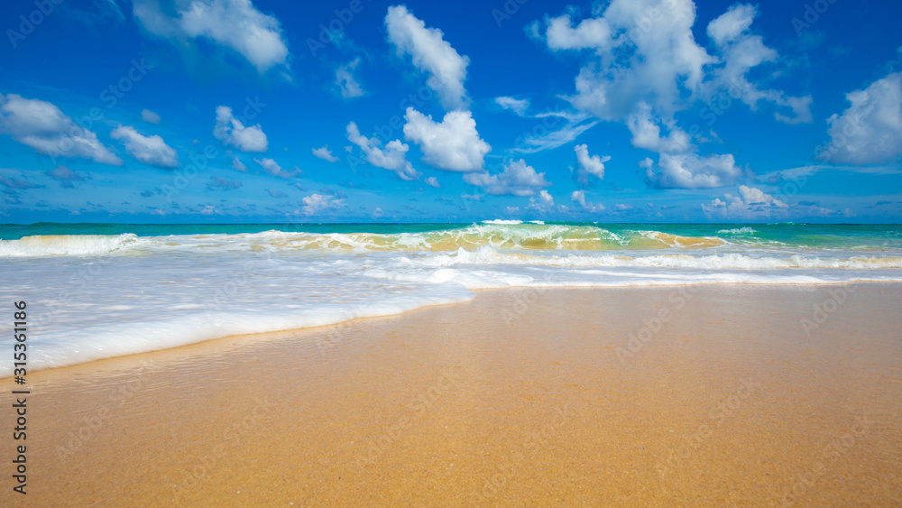 Fototapeta premium White sand beach turquoise sea water against blue sky with cloud seascape vacation background