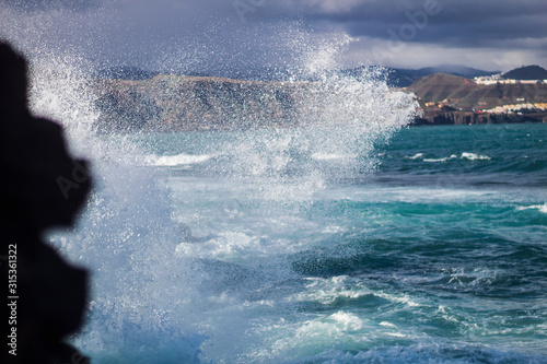 Waves hit the rocks in gran canaria islans, canary islands, spain