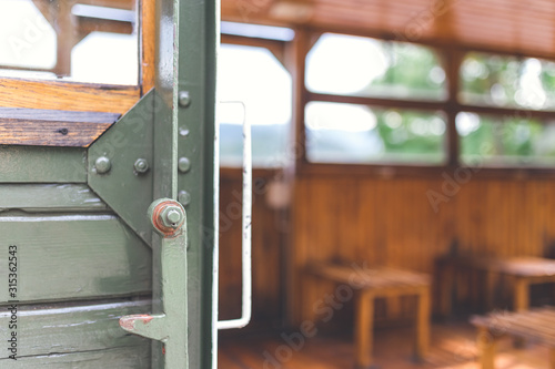 Opened door of old passenger train. Transportation and travel concepts. Space for copy.