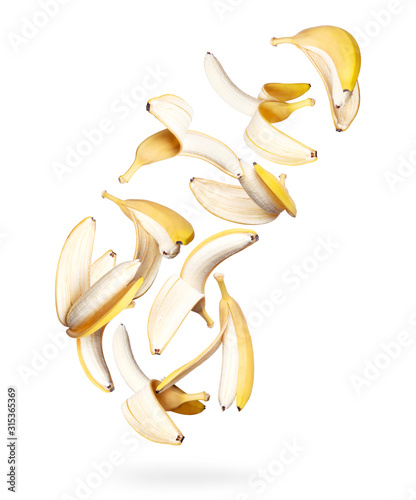 Open bananas in the air isolated on white background photo