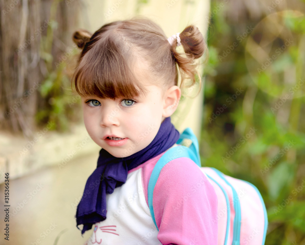 cute little girl on the way to school