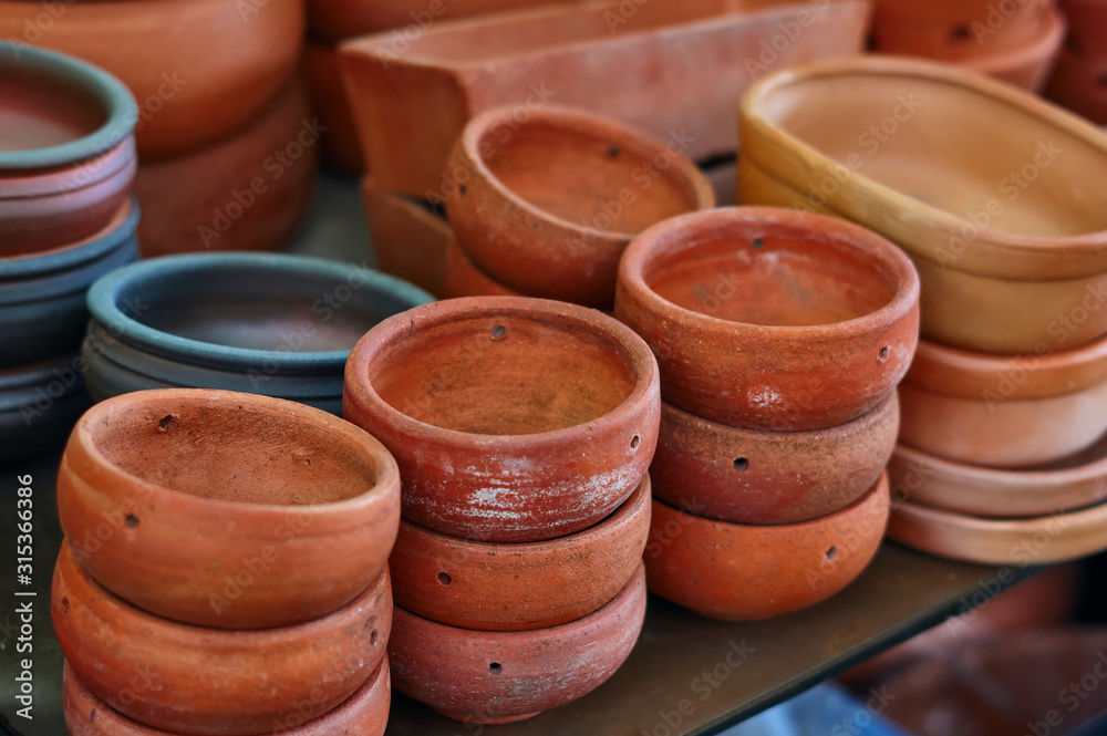 Lots of clay pot in the gardening shop Lots of clay pot in the gardening shop