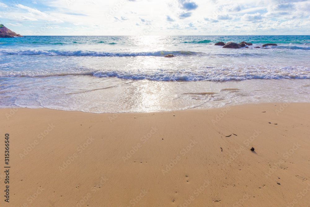 Beautiful sea wave on sandy beach evening sunset light Beautiful sea wave on sandy beach evening sunset light
