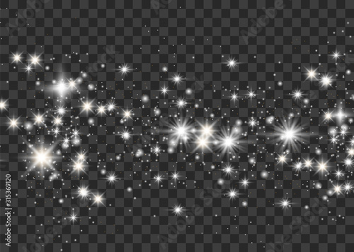 The dust sparks and golden stars shine with special light. Vector sparkles on a transparent background. Christmas light effect. Sparkling magical dust particles.