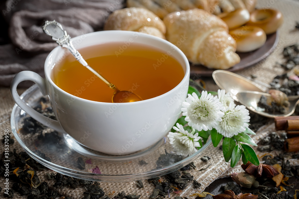 Tea in a cup on an old background Tea in a cup on an old background