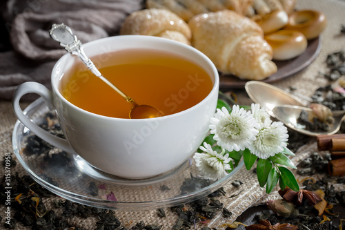 Tea in a cup on an old background