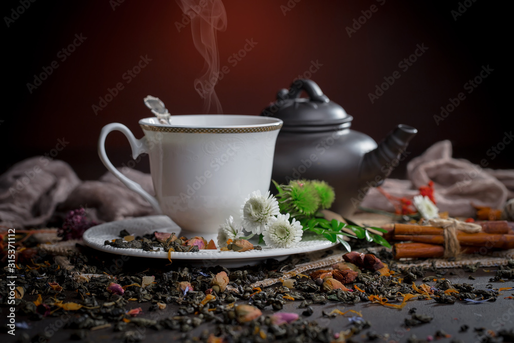 Tea hot drink on old background in composition on the table Tea hot drink on old background in composition on the table