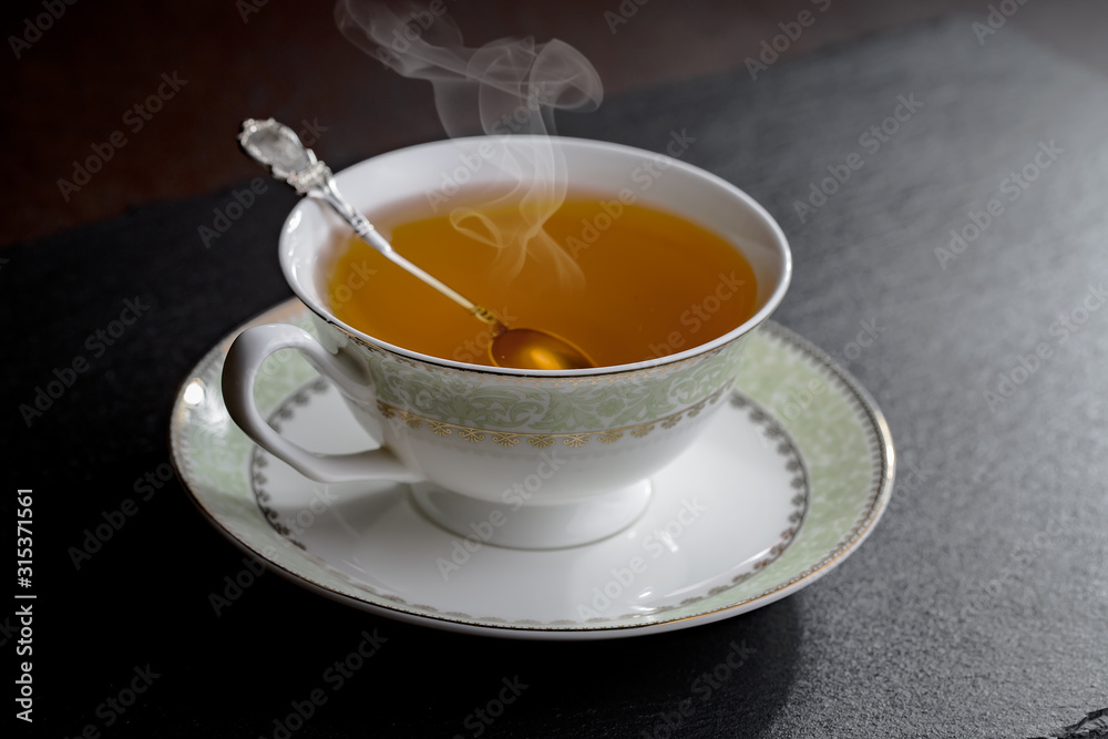 Tea hot drink on old background in composition on the table Tea hot drink on old background in composition on the table