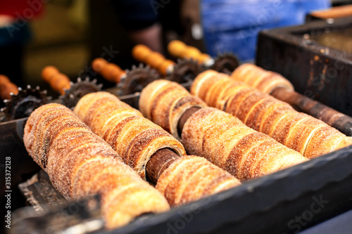 A popular national street food of the Czech Republic. Baking at the street stalls of the popular Trdlo.