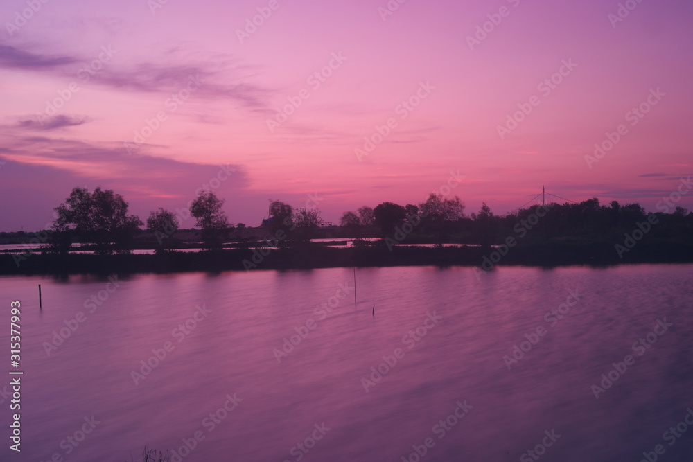 Purple and pink twilight over the lake