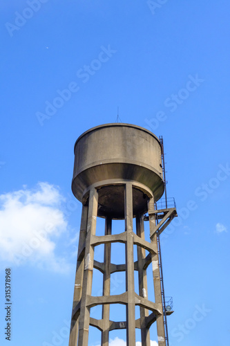 Old Water Tank Tower in the blue sky view