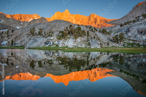 Mount Irvine reflections in Sailor Lake at sunrise, Inyo National Forest, California, USA photo