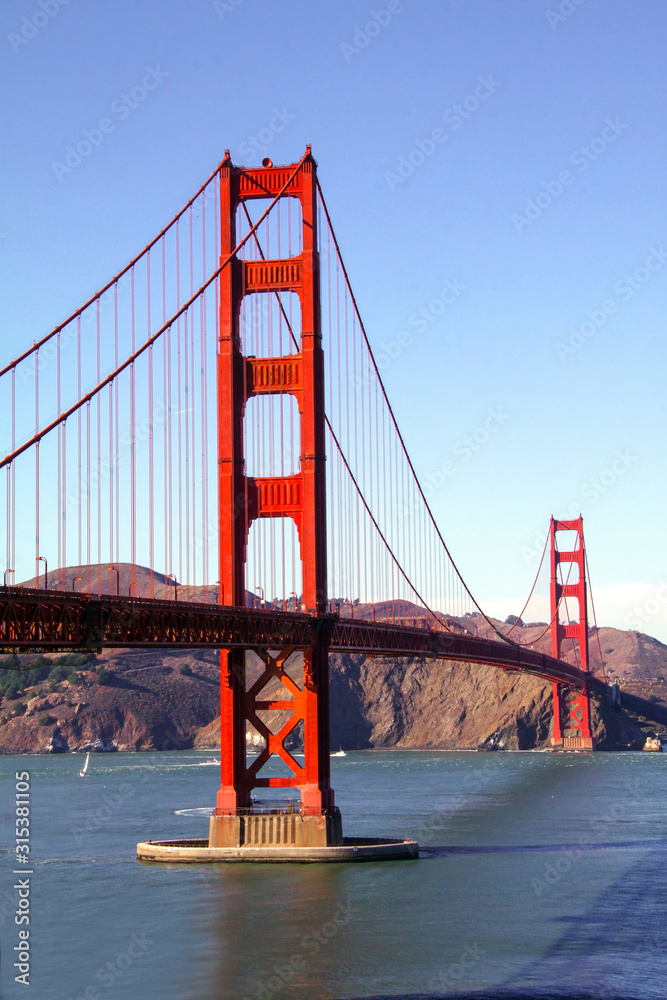 Fototapeta premium Golden Gate Bridge in San Francisco, USA. View of bridge and the bay on a sunny day with copy space.