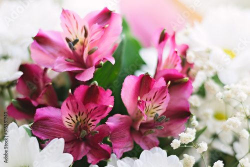 Floral composition of white chrysanthemum and rose Alstroemeria flowers. © Viktoryia
