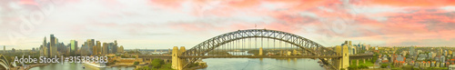 Sydney Harbour Bridge at dusk. Panoramic aerial view from drone © jovannig