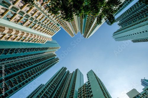 Canvas Print looking up on high-rise apartment building, residential building facade, hongkon