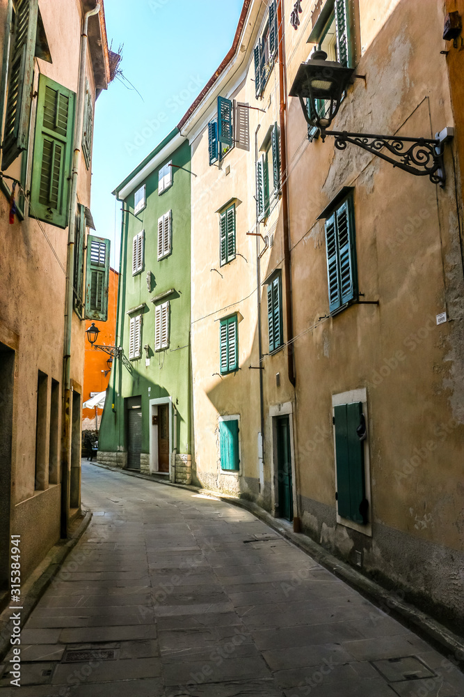 Muggia, Italy. Beautiful streets of Muggia in sunny day.