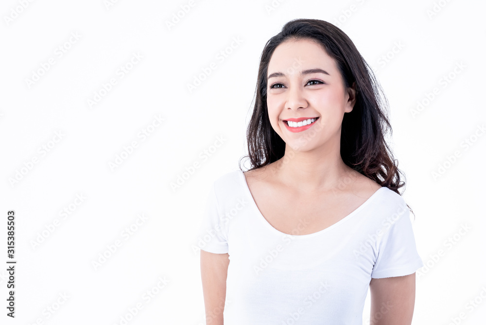 Portrait images of Asian young, pretty woman is 25 years old, She is smiling brightly, She has beautiful white and clean teeth, sparking eyes On white background to people and beauty concept. Portrait images of Asian young, pretty woman is 25 years old, She is smiling brightly, She has beautiful white and clean teeth, sparking eyes On white background to people and beauty concept.