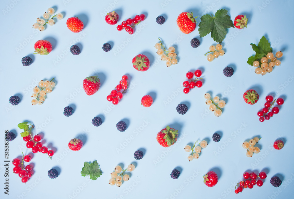 Colorful pattern made of fruits, leaves and berries Colorful pattern made of fruits, leaves and berries