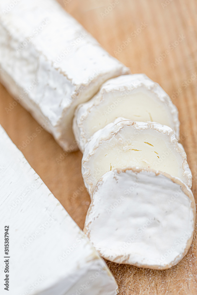 Fresh cheese on Wooden board. Cheese platter Fresh cheese on Wooden board. Cheese platter