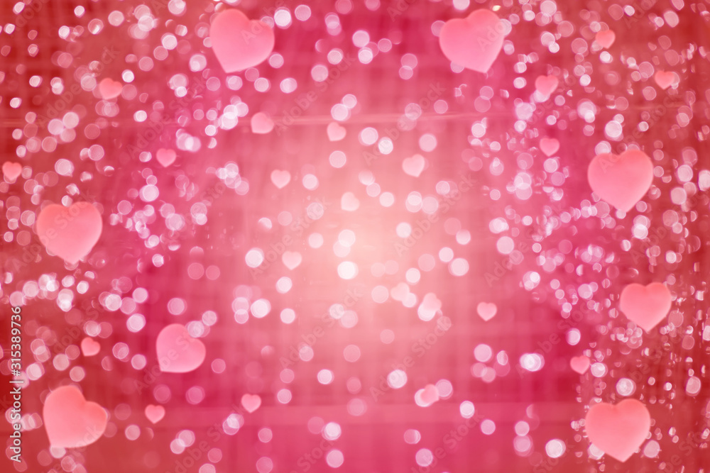 Defocused abstract red background with space for text. Blurred bokeh background of Valentine Day with hearts