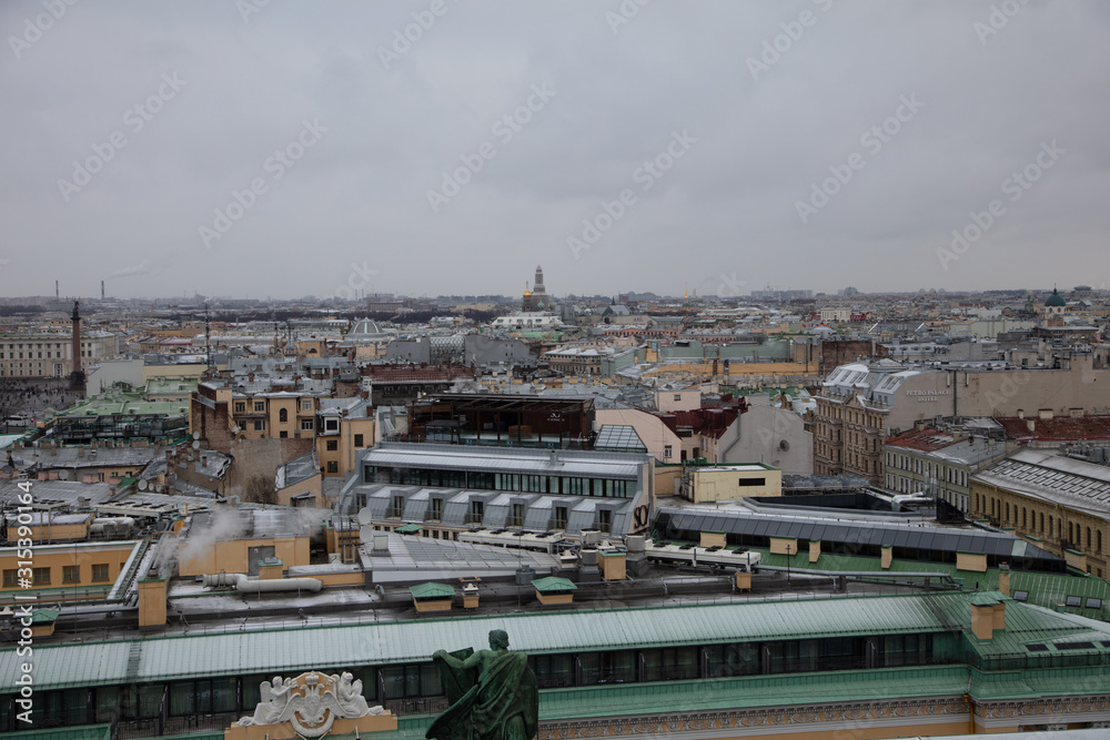 Beautiful view of St. Petersburg from the observation deck of St. Isaac's Cathedral on a blue cloudy day.