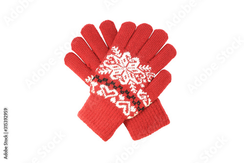 Red womens knitted wool winter gloves with pattern isolated on white background