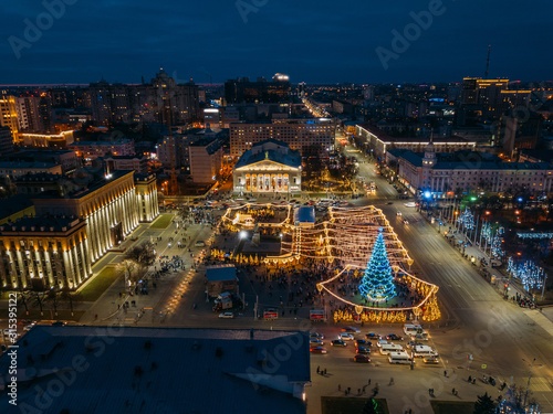 Street illumination during new year celebration in central square of Lenin in Voronezh  Russia  aerial view