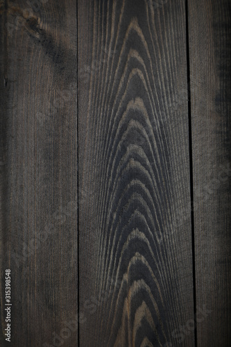 Wooden rustic textured dark background.Top view. Copyspace.