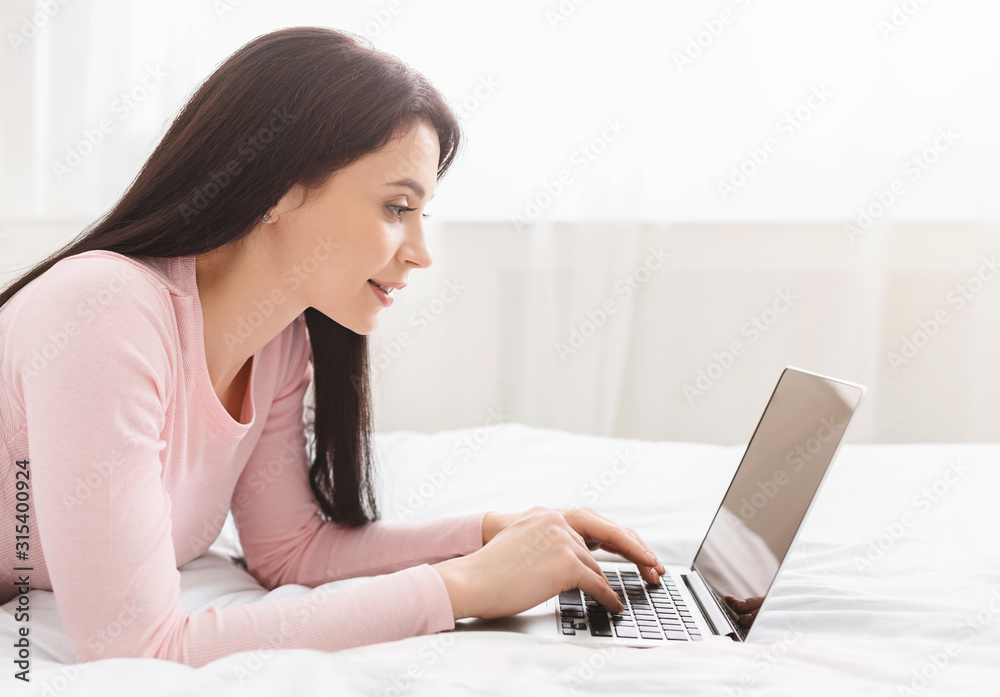 Young woman chatting with boyfriend in internet Young woman chatting with boyfriend in internet