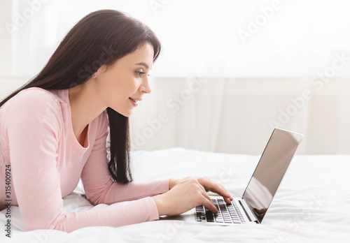 Young woman chatting with boyfriend in internet