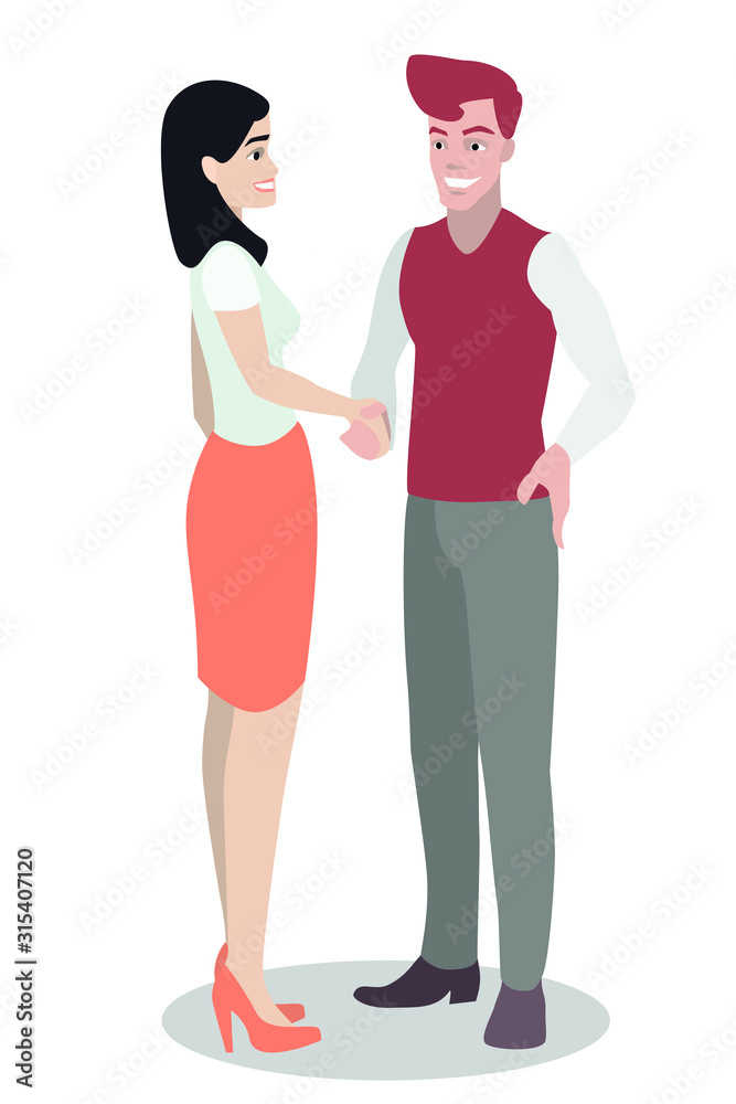 A young white guy stands and shakes hands with a girl. Ideal for advertising and presentation. A young white guy stands and shakes hands with a girl. Ideal for advertising and presentation.