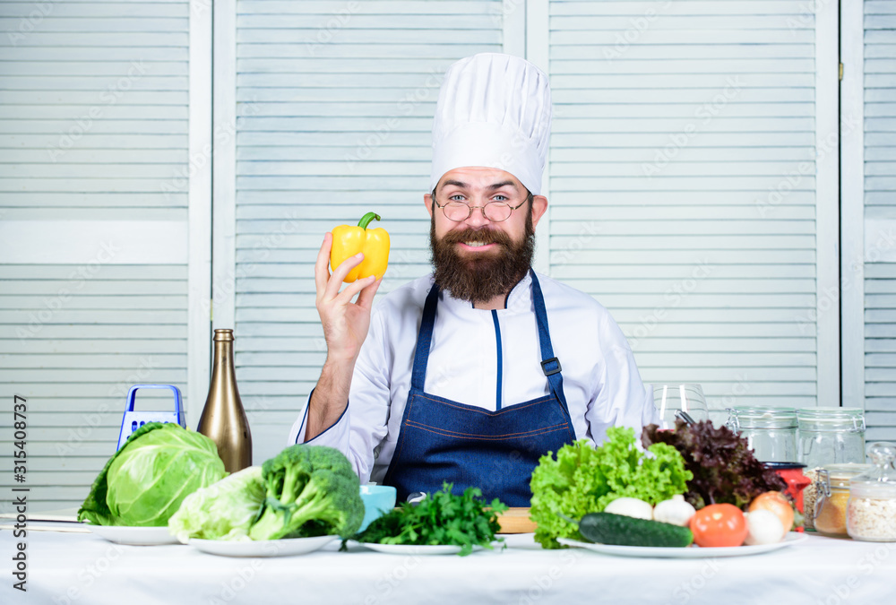 Dieting and organic food, vitamin. Healthy food cooking. Bearded man cook in kitchen, culinary. Vegetarian. Mature chef with beard. Chef man in hat. Secret taste recipe. Some food Dieting and organic food, vitamin. Healthy food cooking. Bearded man cook in kitchen, culinary. Vegetarian. Mature chef with beard. Chef man in hat. Secret taste recipe. Some food