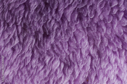 Texture of purple fabric with villi
