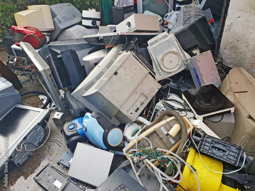 Pile of used electronic and housewares waste