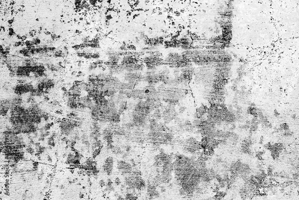Fototapeta premium Texture of a concrete wall with cracks and scratches which can be used as a background