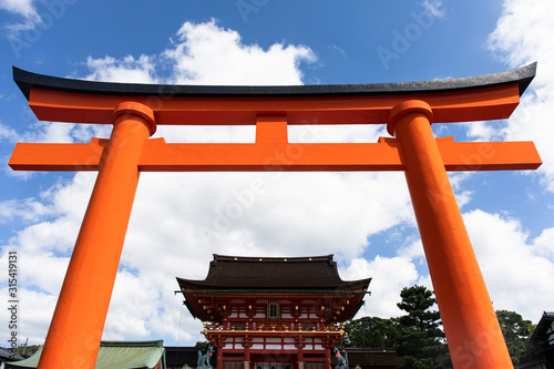 Japan, Kyoto Prefecture, Kyoto City, Red torii gate of Fushimi Inari-taisha shrine photo