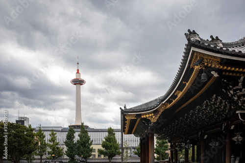 Wallpaper Mural Japan, Kyoto Prefecture, Kyoto City, Exterior of Buddhist temple with Kyoto Tower standing in background Torontodigital.ca