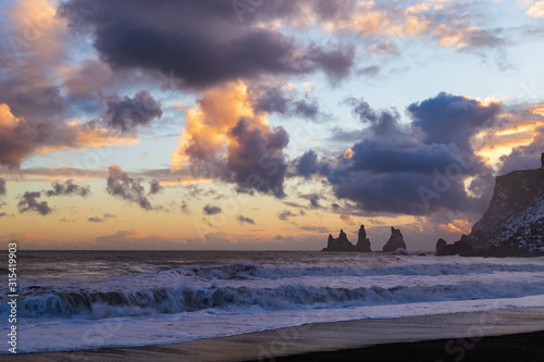 Iceland winter  trolls fingers rock  Vik village  sunset in Iceland