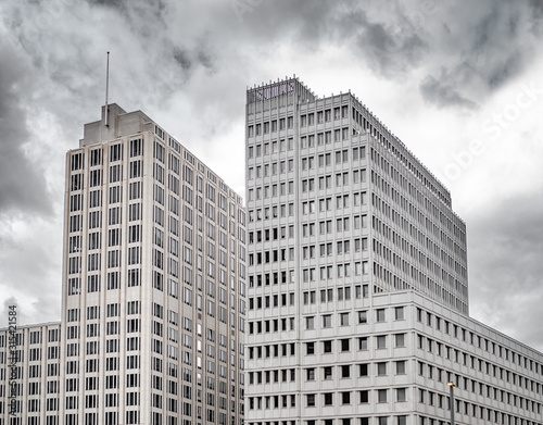 Building on a background of cloudy sky.