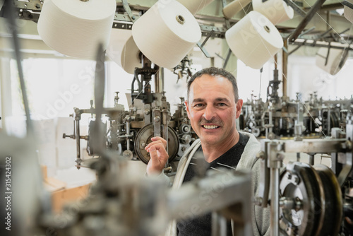 Portrait of the owner of a circular knitting mill